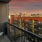 a balcony overlooking a city