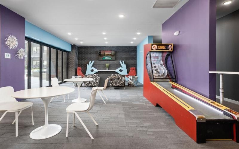 a room with tables and chairs