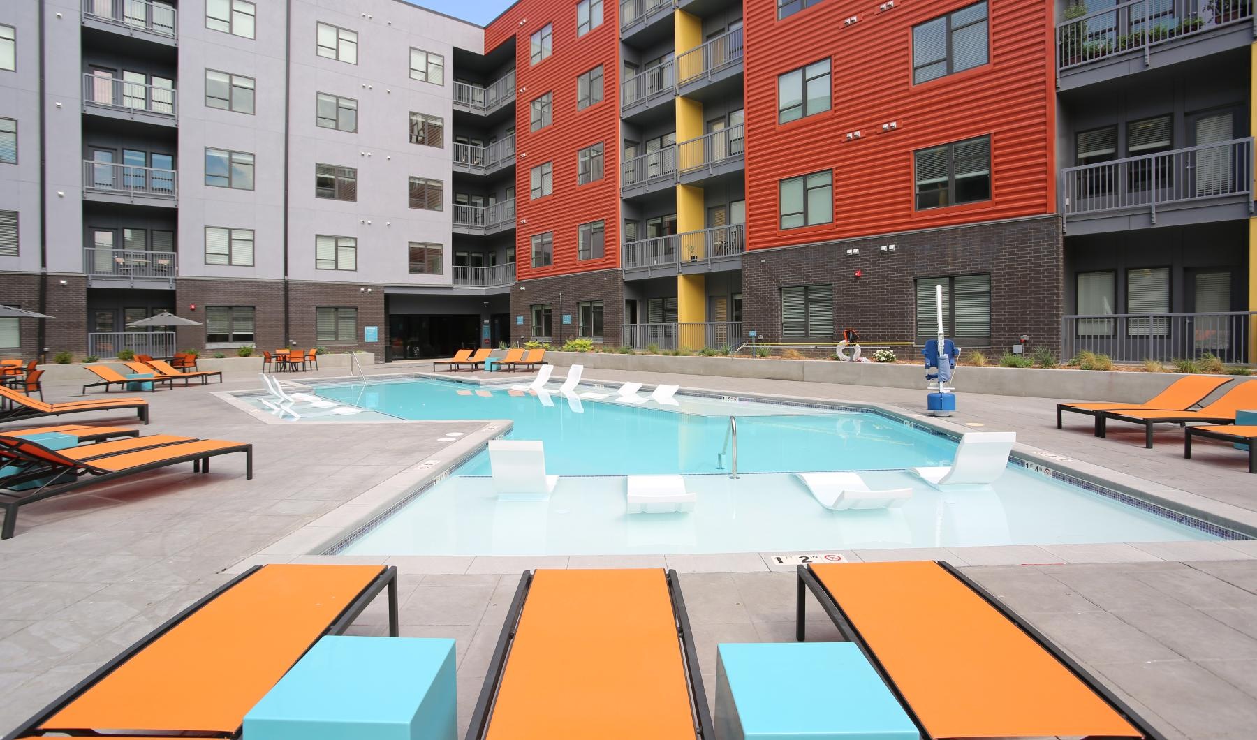The essence of exceptional living a swimming pool in a courtyard between buildings
