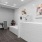 a dog spa with a bathtub and sink